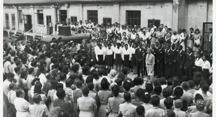 Workers at Labor Day exercises gather to hear a chorus of Arsenal workers sing spirituals; Picatinny Arsenal, Dover, N. J., 13 Dec. 1944